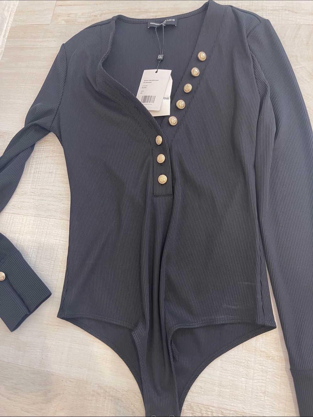 Generation Love Black Ribbed Long-Sleeve Bodysuit with Gold Buttons